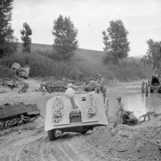 Anti-Tank Regiment is towed across the River Foglia during the assault on the Gothic Line