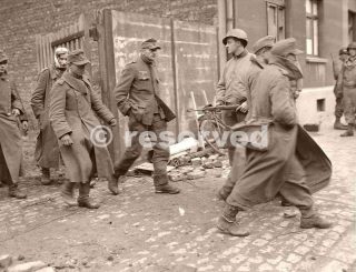 GI with M1 Carbine and German POW's Aachen Germany 1944_nazi soldier